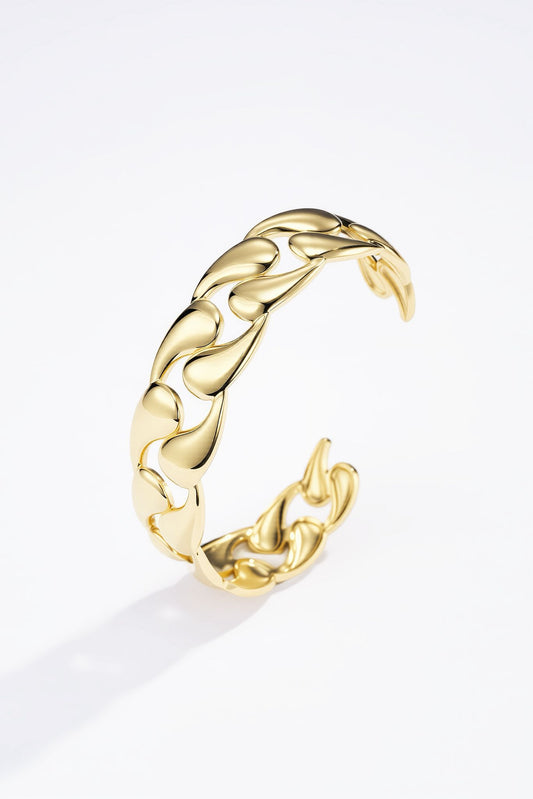 Bracelet Liane – Manchette dorée à maillons sculptés