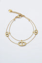 Bracelet Élégia – Double chaîne dorée & maillons dior