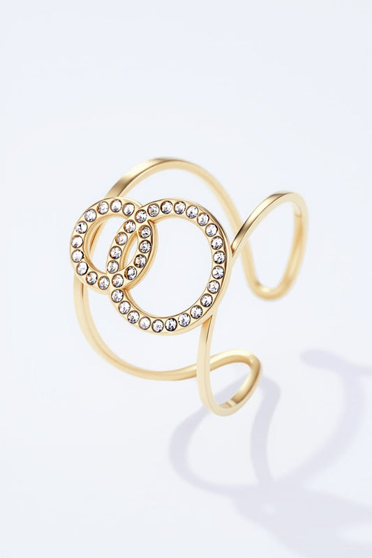 ✨ Bague Éclat – Anneaux entrelacés scintillants en acier inoxydable doré