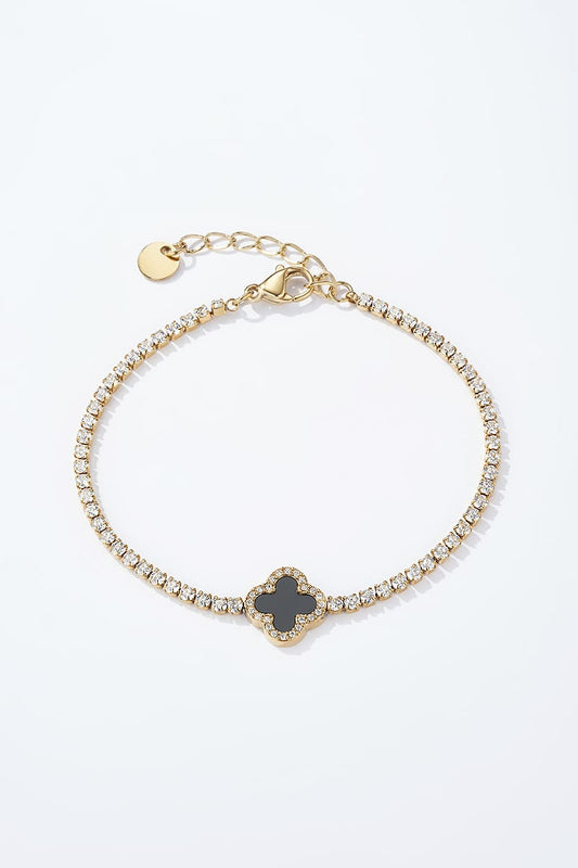 Bracelet Noctis – Trèfle noir et strass en acier doré